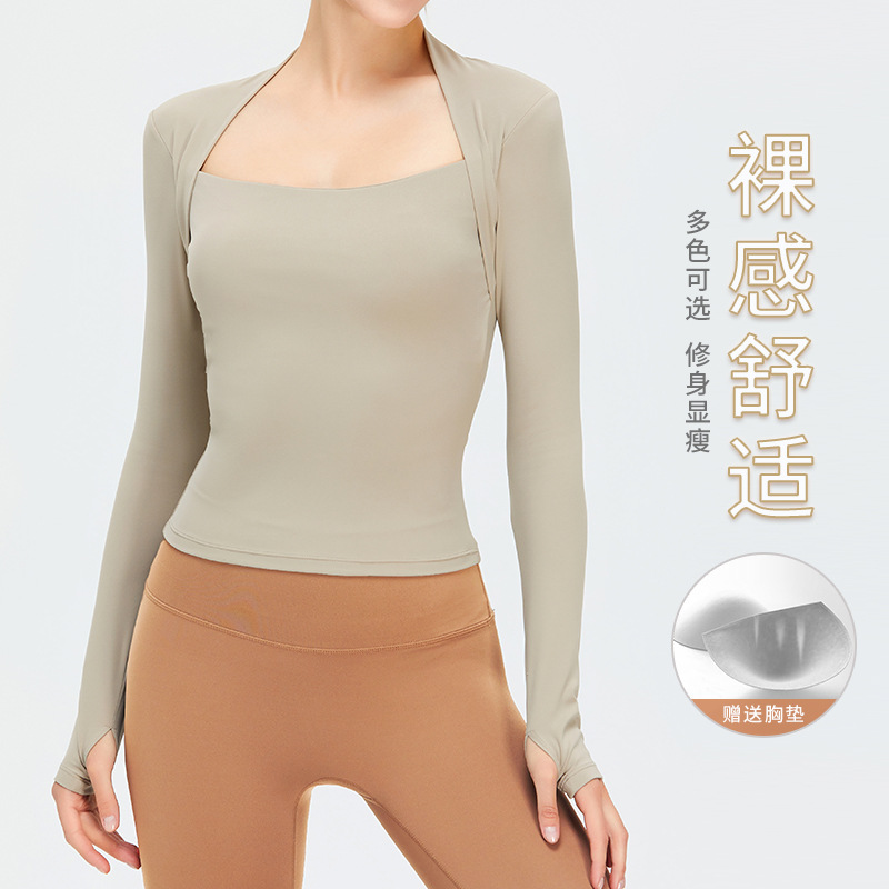 Ropa de yoga caliente en vivo top deportivo desnudo de manga larga con almohadilla en el pecho chal falso de dos piezas ropa de entrenamiento con cuello en U