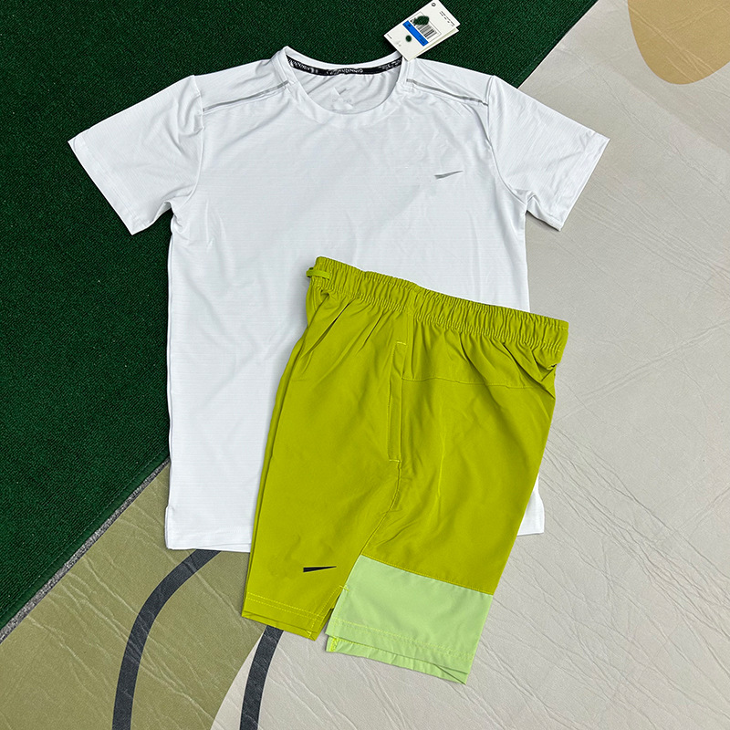 Mayorista nuevo juego de comercio exterior deportivo fitness juego de carrera rápida secado transpirable suelto ocio pantalones cortos de manga corta ropa de hombre