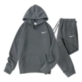 Dark gray suit, white label
