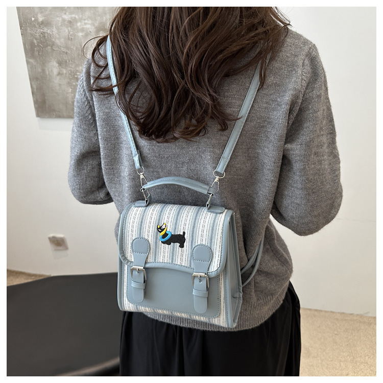 The new backpack for the autumn of 2024 is a fashionable and simple hand-held student single-shoulder bag with a checkered lid and a retro crossbody style undefined
