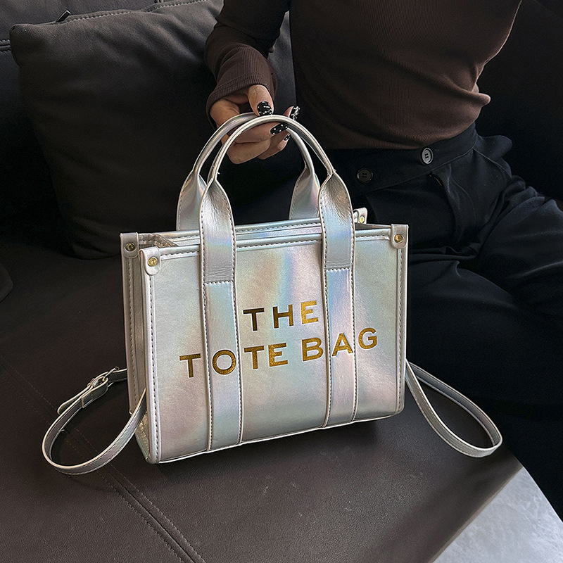 Perla brillante superficie portátil bolsa de mano para las mujeres 2023 nuevo sudeste asiático moda nicho textura hombro mensajero bolsa