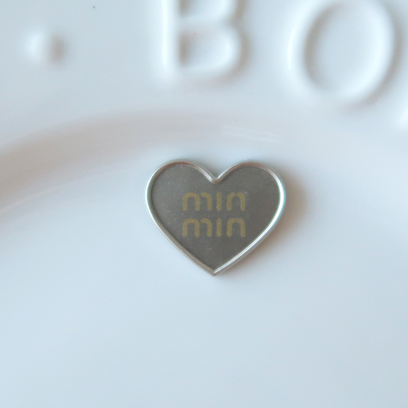 人気メッキ愛蝶ネクタイアクセサリー高級感シルバーグレー笑顔ヘアアクセサリー材料卸売り