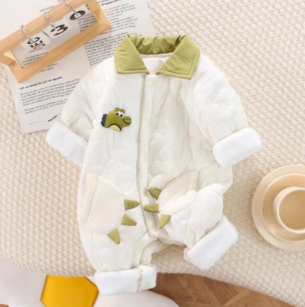 Ropa de bebé otoño e invierno nuevo estilo dinosaurio de dibujos animados bebé hombre mono acolchado más terciopelo cálido estilo occidental
