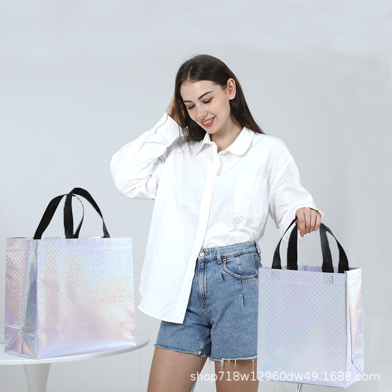 En stock nueva bolsa de regalo no tejida láser bolsa de regalo de boda bolsa de fiesta de comercio exterior logotipo imprimible