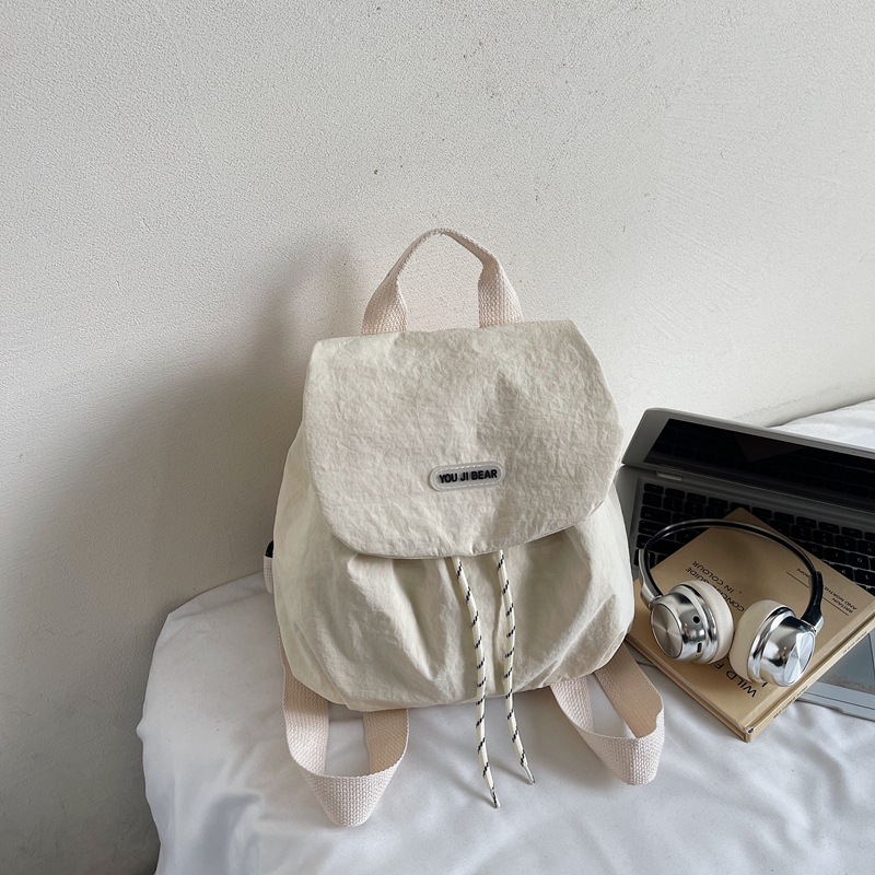 Bolsa de nylon ligera de moda para mujeres 2025 nueva moda versátil estilo coreano para estudiantes universitarios viajes mochila de hombro