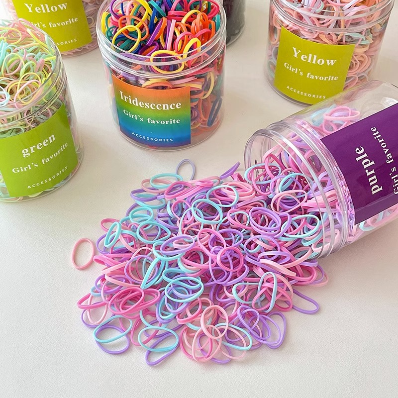 El cabello del bebé está atado, la banda elástica alta, la banda elástica desechable, la trompeta de color para niños no daña el cabello, la banda elástica pequeña