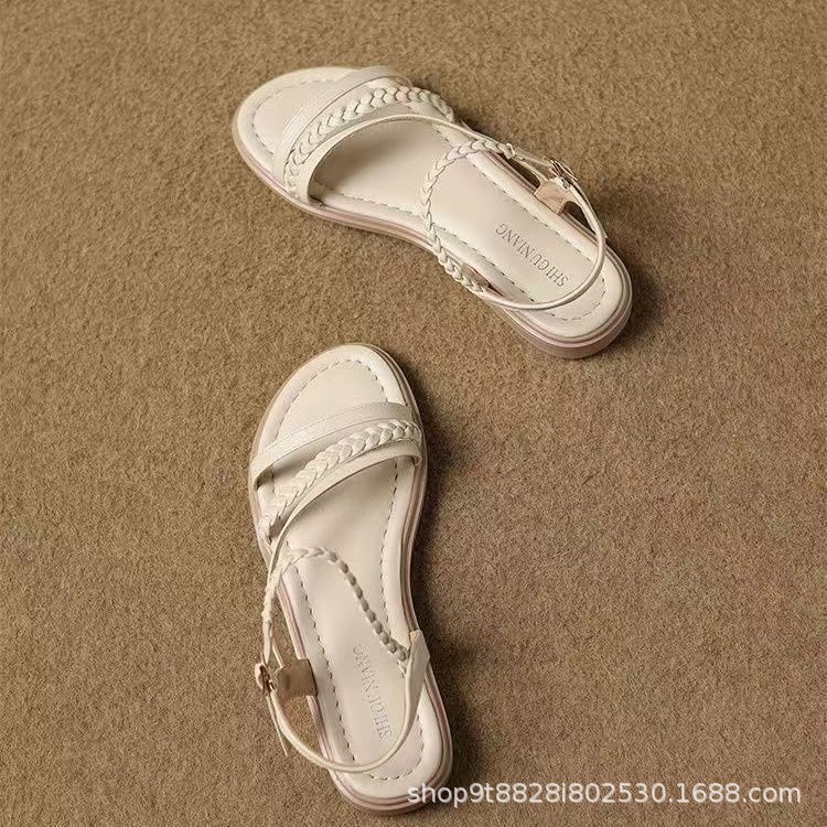Zapatos para mujeres verano de 2026 nuevo estilo de hadas piso plano tejiendo sandalias francesas para estudiantes sandalias romanas de suela suave