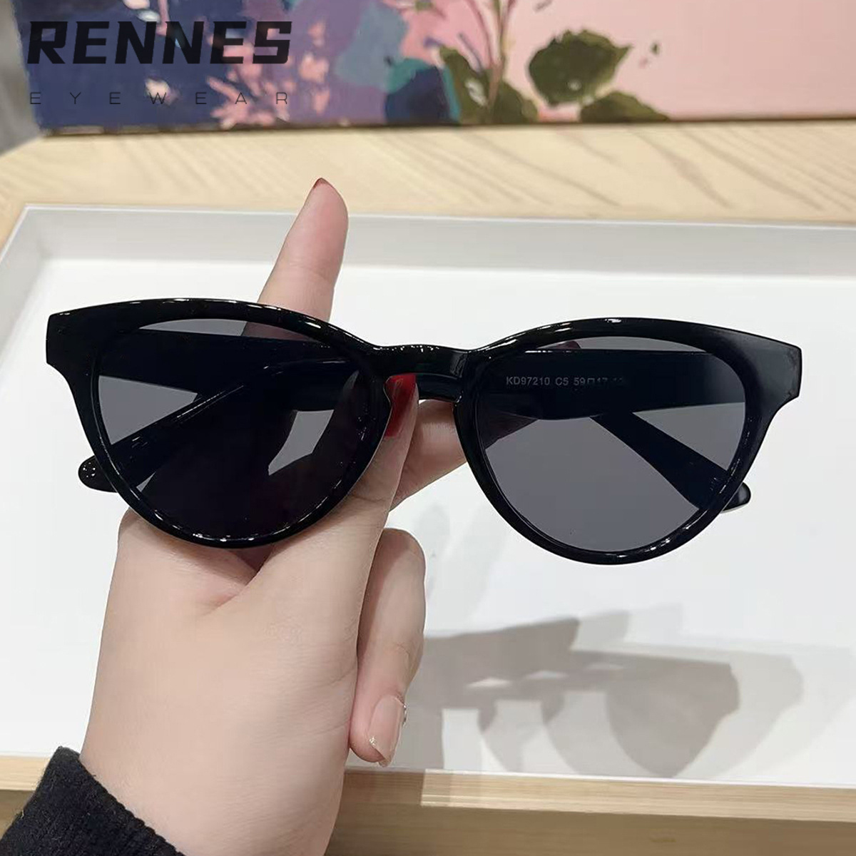 Nuevo estilo transfronterizo al por mayor ojo de gato gafas de sol para exteriores celebridades de Internet para mujeres con el mismo estilo de fotografía callejera personalizada con gafas de sol esenciales