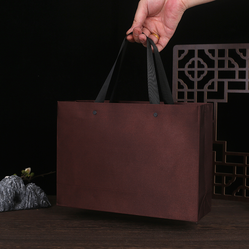 Bolsas de regalo de seda bolsas de té Pu 'er bolsas de mano bolsas de mano café bolsas de ropa bolsas de negocios personalizadas