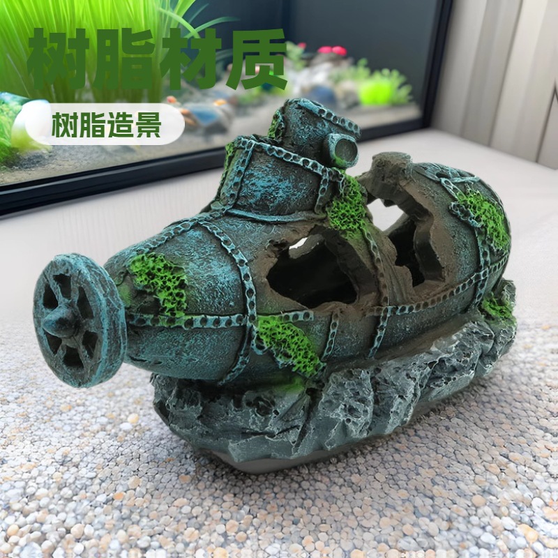 Fish tank landscaping and decorative boat to avoid the house…