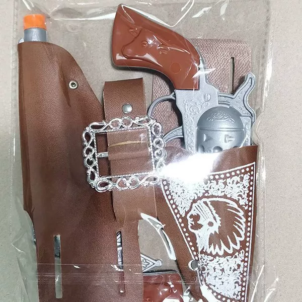 Silver revolver, denim toy