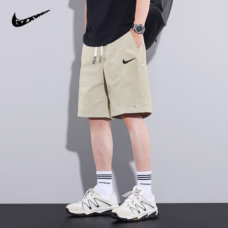 Summer men's ice silk quick-dry shorts, loose-fitting casual knee-length pants, outdoor running sports pants, trendy beach pants Summer men's ice silk quick-dry shorts, loose-fitting casual knee-length pants, outdoor running sports pants, trendy beach pants