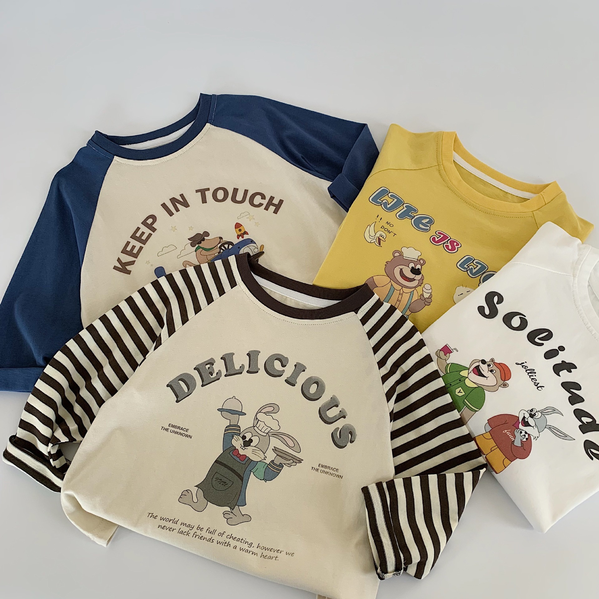 Camiseta infantil Mai Bao 2025 otoño lindos pantalones de primavera y otoño de cuello redondo impresión de dibujos animados de manga larga casual t