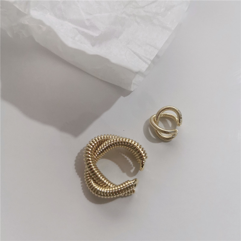 Fashion Geometric Cross Metal Winding Alloy Earrings Wholesale display picture 3