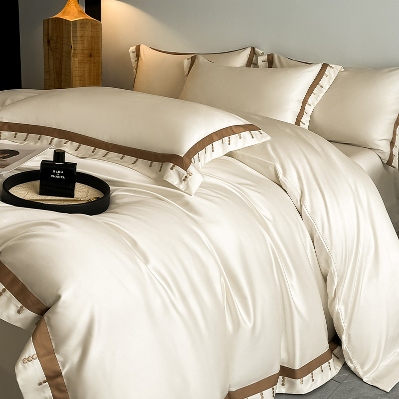 2025 nueva clase A 100 algodón de lana larga de Xinjiang algodón puro algodón de cuatro piezas ligero bordado de lujo algodón conjunto de cuatro piezas