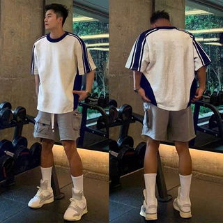 工厂直销夏季新款时尚纯棉圆领撞色拼接插肩宽松短袖男女T恤定制