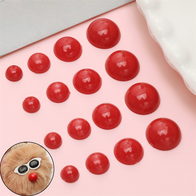 Red acrylic round doll