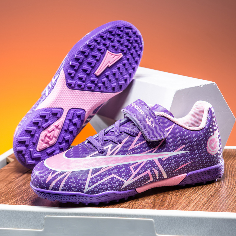 Zapatos de fútbol transfronterizos de alto perfil para hombres TF zapatos de entrenamiento antideslizante transpirables para niños zapatos deportivos profesionales para estudiantes