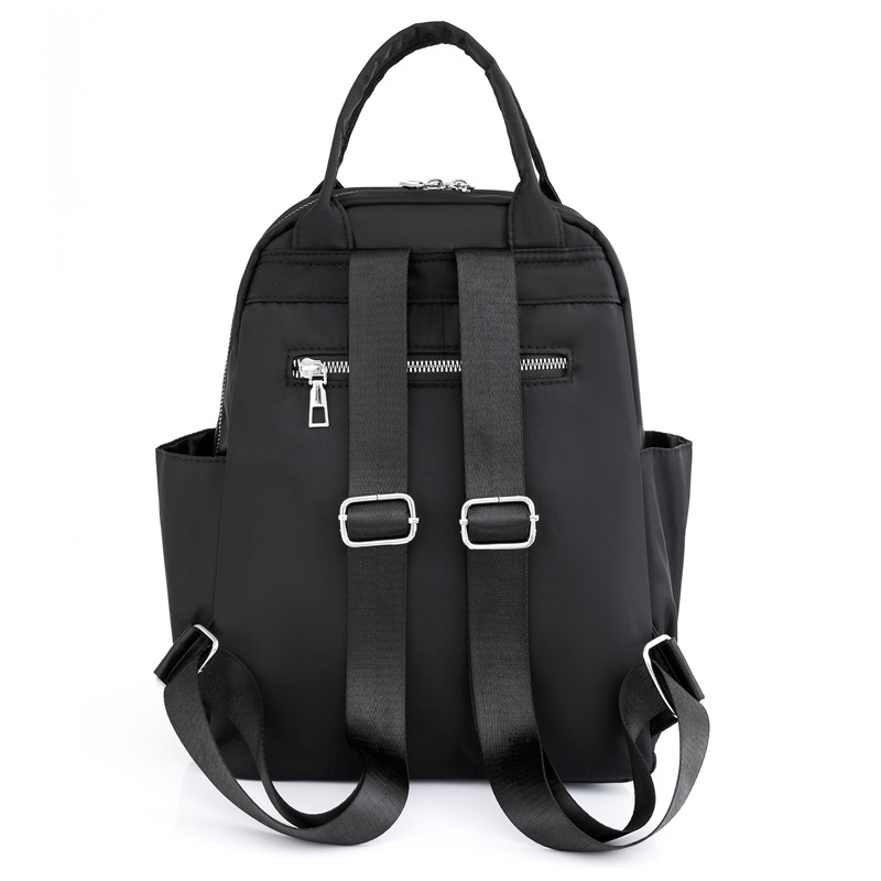 Spot wholesale 2023 nueva mochila Oxford casual para mujer, mochila de viaje de gran capacidad simple de moda