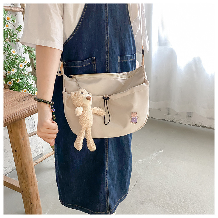 The new 2022 Little Bear canvas small bag for women is simple and versatile. The student dumpling bag is a trendy casual single-shoulder crossbody bag undefined