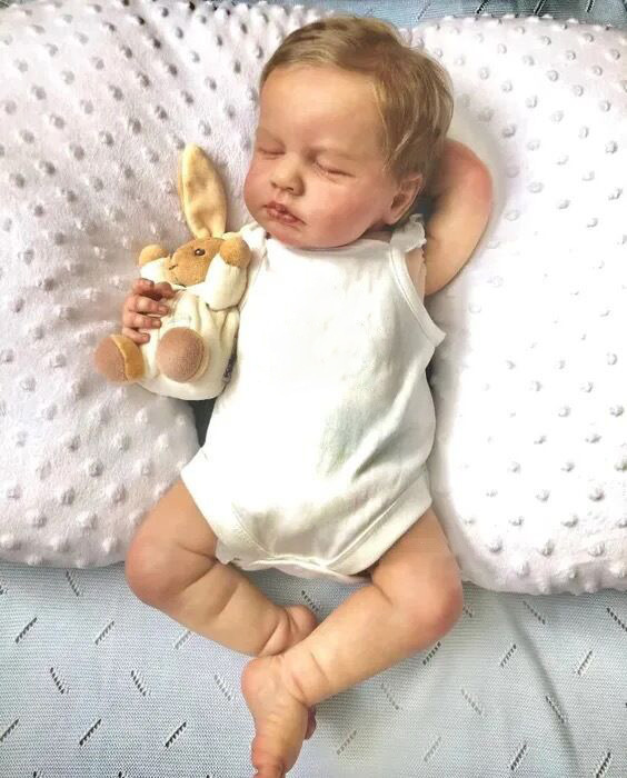 Como se muestra en la imagen de la muñeca