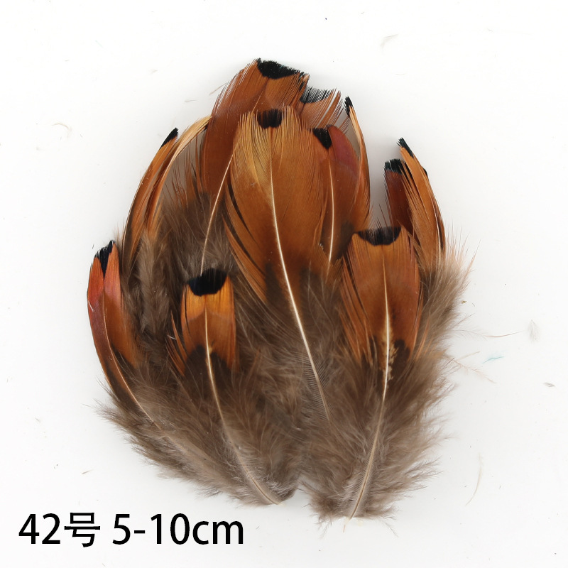 Fábrica al por mayor de bricolaje plumas pequeñas plumas naturales plumas de pollo salvaje plumas de pato jardín de infantes joyas hechas a mano gato divertido material de captura de sueños