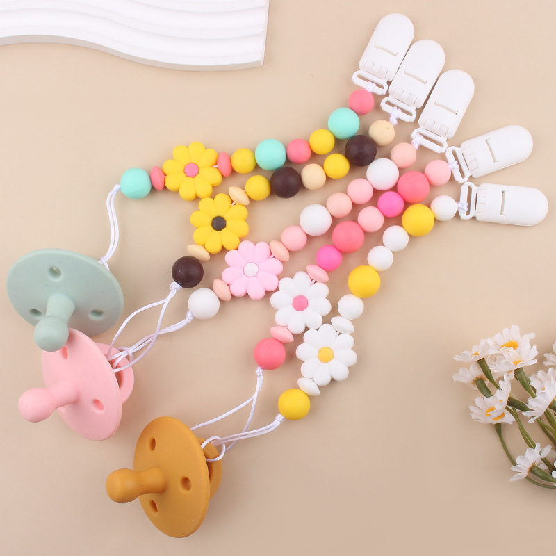 Productos para bebés Clip de chupete de plástico de bricolaje para bebés Creativo para bebés Little Daisy Silicona Mouth Pezones anti-caída de la cadena