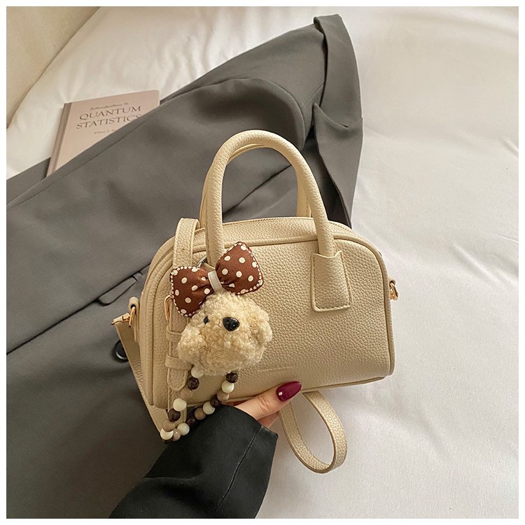 Bolsa de brazo retro nicho para mujeres 2026 nueva moda coreana bolsa de bolos portátil de gran capacidad bolso de hombro