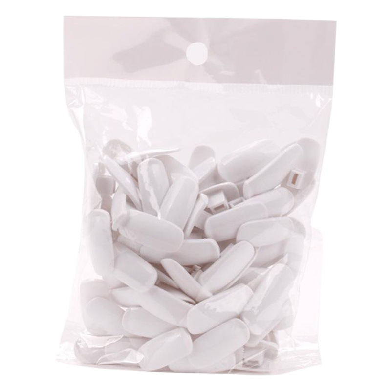 Manicura al por mayor conjunta flexible artificial mano a juego práctica clavo pieza bolsa móvil mano manipulador uñas pieza tres colores