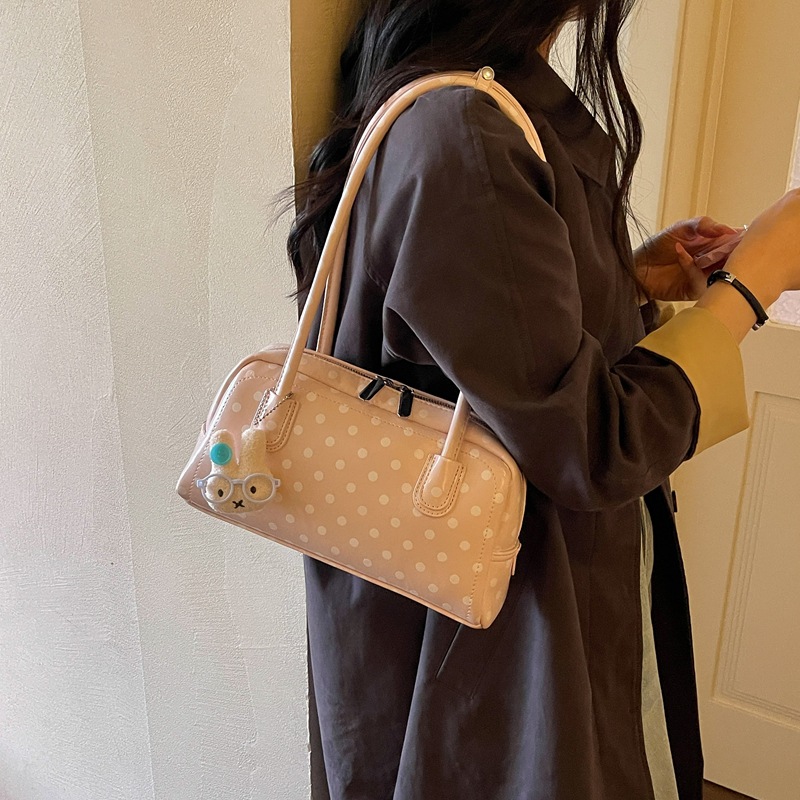La versión coreana de Xiaozhong Wa punto de bolso de almohada de mano casual 2026 nueva moda versátil bolso de hombro bolso de brazo de alto valor