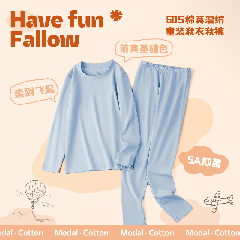 Conjunto de pantalones y tops térmicos finos de manga larga para niños y niñas de otoño e invierno de algodón modal, adecuado para salir o como pijama, color sólido, en stock.