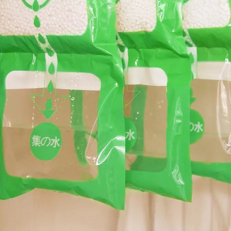 Home hanging wardrobe dehumidification bag room indoor hanging moisture-proof anti-mold moisture-absorbing clothing dryer absorbent bag