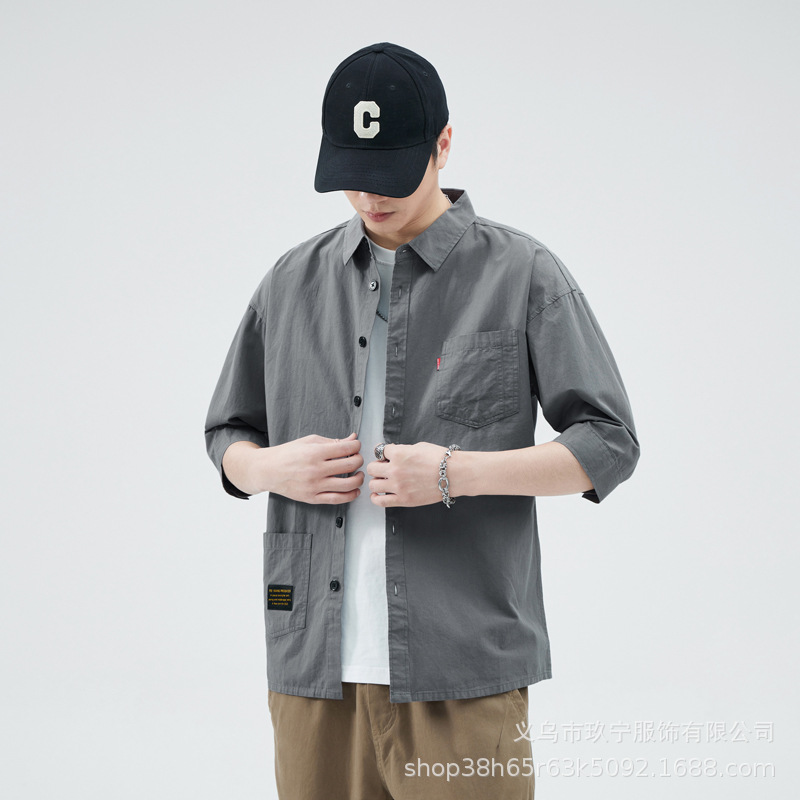 Camisas de primavera y verano para hombres, estilo americano de alta gama, estilo de moda de Hong Kong, estilo de varios bolsillos, camisa casual suelta