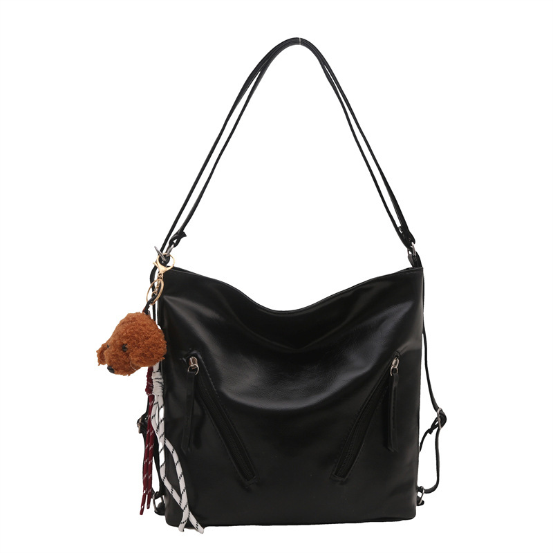 Bolsa de hombro de cuero suave para viajes de gran capacidad 2024 otoño y invierno nuevo nicho de diseño coreano de color sólido bolsa de hombro