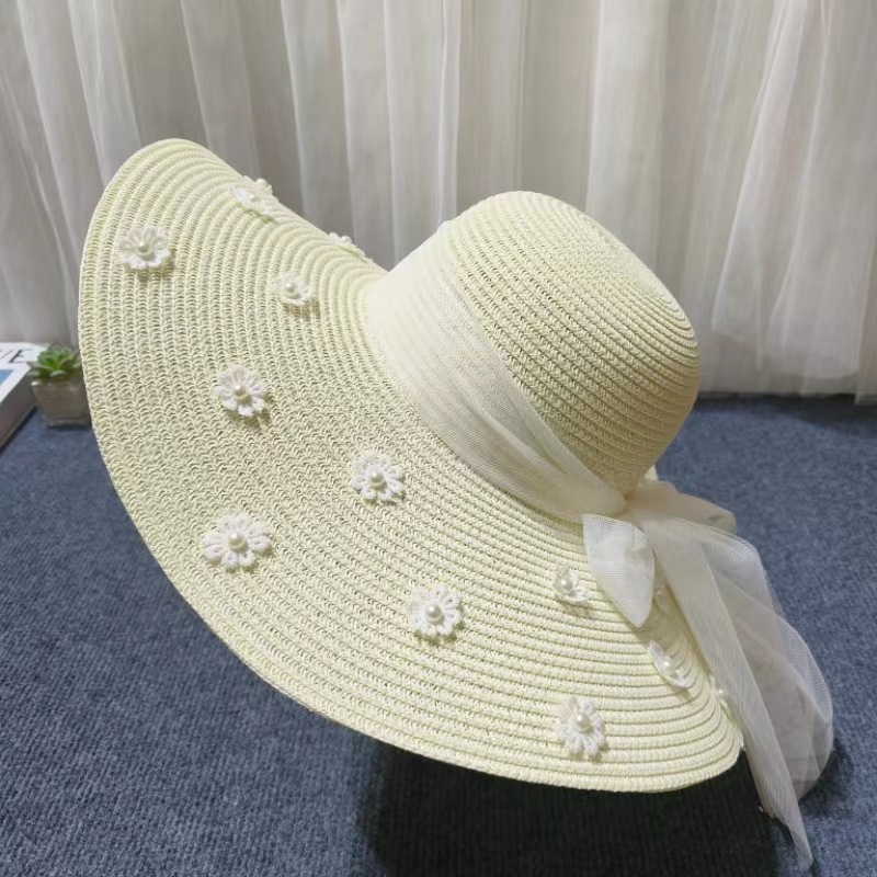 Women's Cute Sweet Simple Style Flower Embroidery Pearl Wide Eaves Straw Hat display picture 9