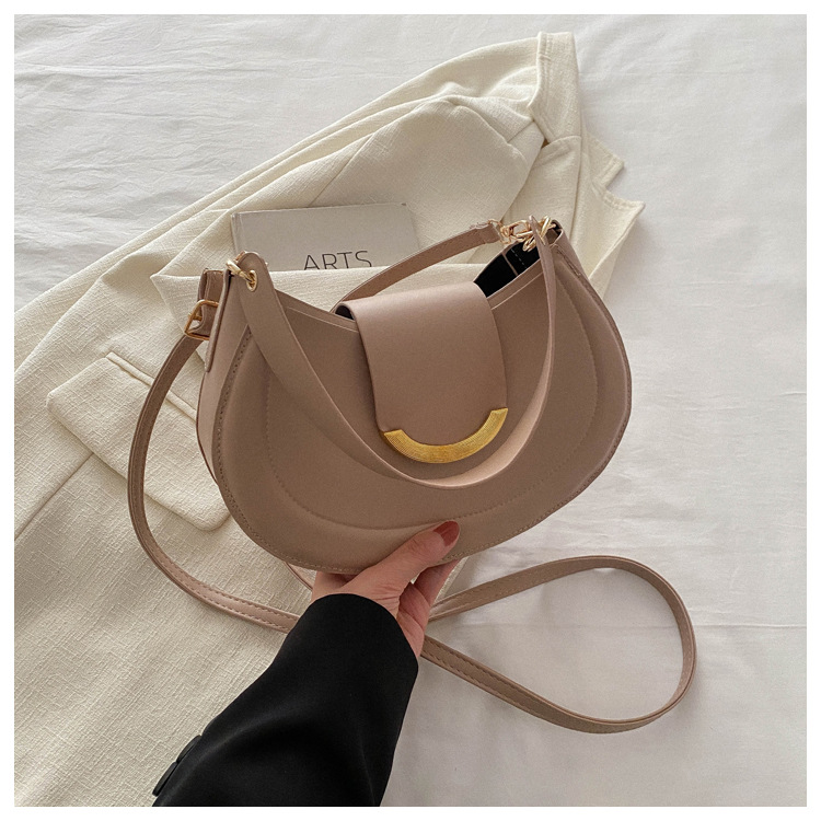 Estilo occidental de moda todo fósforo fresco redondo alta textura este año popular bolsa de color sólido diseño de nicho bolso bandolera