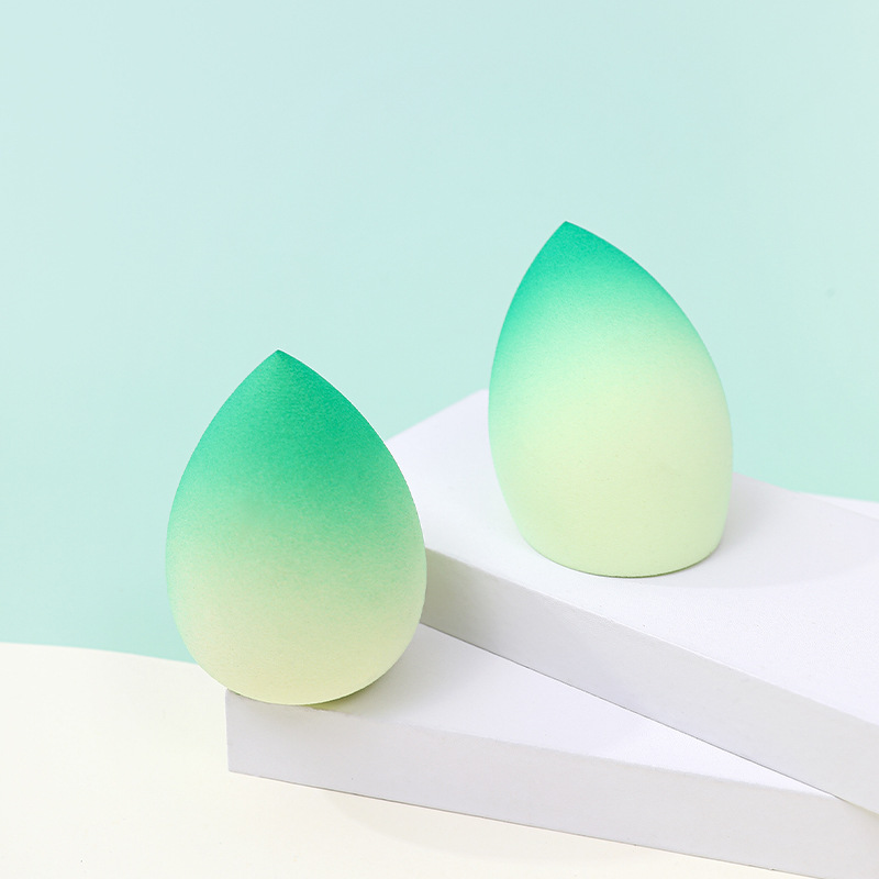 Fábrica personalizada de color degradado transfronterizo maquillaje de belleza huevo soplo de polvo no látex color en aerosol color mixto maquillaje esponja maquillaje huevo al por mayor