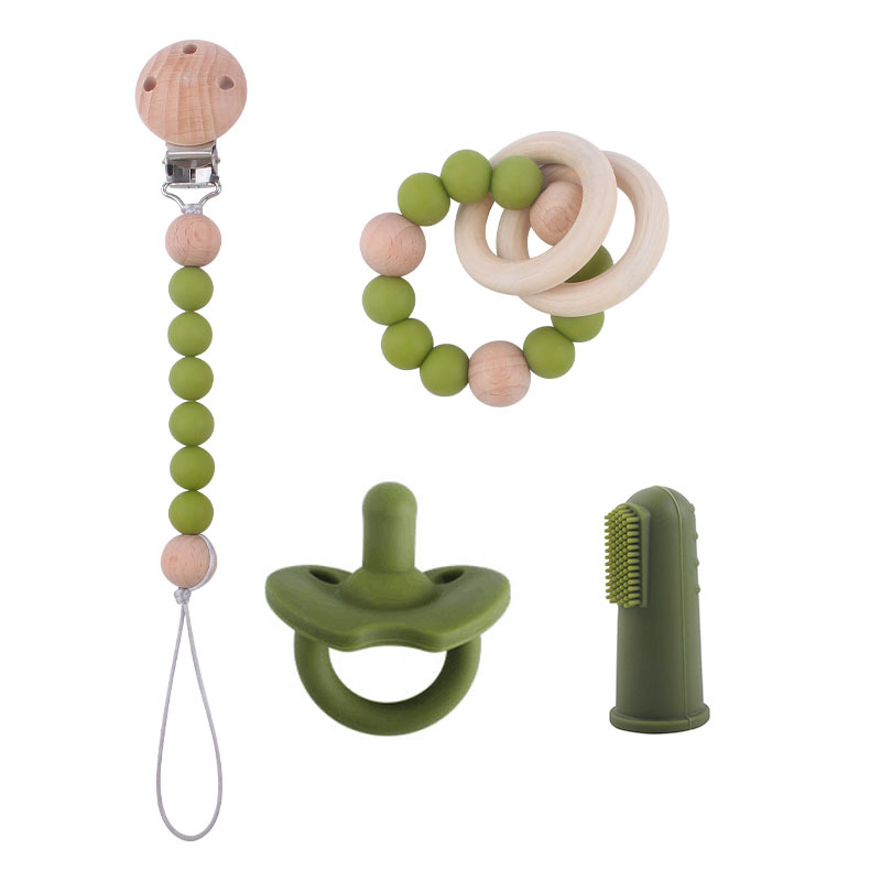 Nuevo bebé suministros de silicona de cuatro piezas conjunto chupete bebé silicona pezón pulsera dedo manga cepillo de dientes pezón cadena