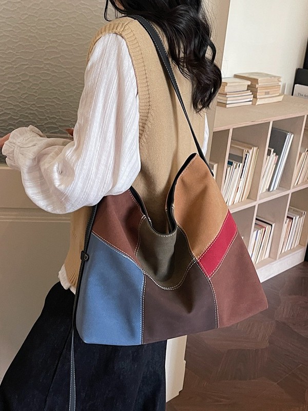 Bolsa de mujer de gran capacidad de hombro bajo la axila venta caliente nueva textura de alta calidad nicho coreano empalme bolso especial
