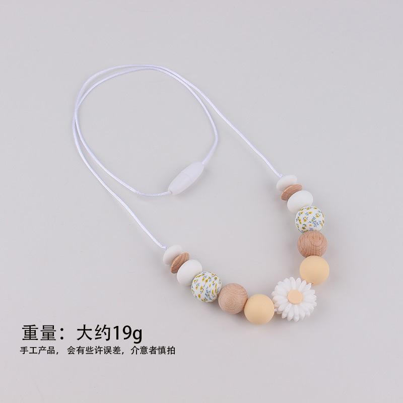 Fábrica nueva margarita collar de mordedor bebé palo molar collar de silicona collar madre