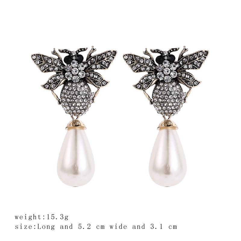 European And American New Alloy Diamond Insect Series Little Bee Ear Studs Exaggerated Pearl Pendant Temperament Female Earrings Hot Sale display picture 2