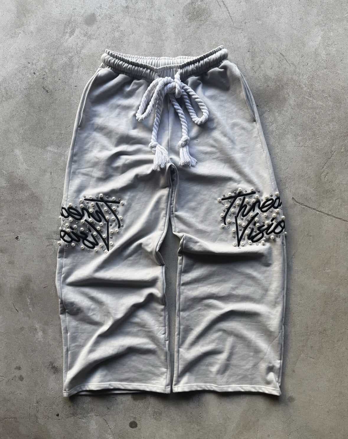 Pantalones sueltos bordados con cuentas bordados de la industria pesada retro de la calle alta europea y americana transfronteriza para hombres y mujeres pantalones casuales de pierna ancha hiphop
