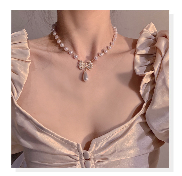 New Elegant Retro Bow Pearl Clavicle Chain Earring Light Luxury Jewelry display picture 3