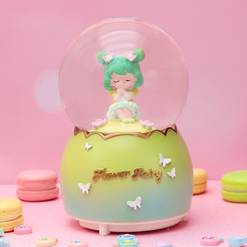 Dibujos animados creativo sueño mariposa bola de cristal caja de música nieve luminosa decoración de escritorio regalo de cumpleaños para niños al por mayor