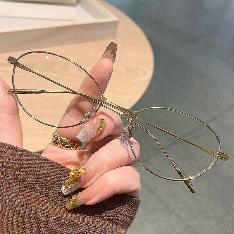 近視の女性用シルバーキャットアイメガネフレームは、楕円形フレーム、純粋な欲望、古いお金スタイル、超軽量近視メガネフレームを装備できます。|undefined
