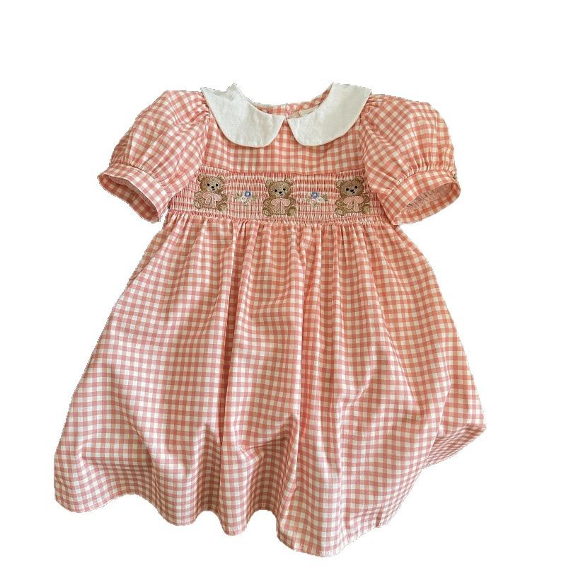 Xianning siete ropa para niños 25 nuevos vestidos para niñas Xia Yang Qi niña versión coreana del bordado a cuadros para niños mangas abullonadas