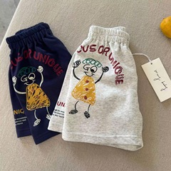 頭の大きいお父さんの子供の夏の半ズボンの男性は外で子供の漫画の中のズボンの純綿の潮の赤ちゃんの5分のズボンの女性の薄い金を着ます。
