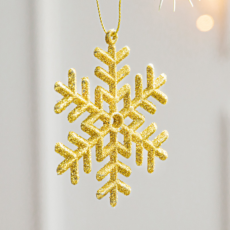 香港恒クリスマス金色プラスチック粉をまいた雪の花片はクリスマスツリーの装飾品を飾ってクリスマスの配置材料を飾ります。|undefined
