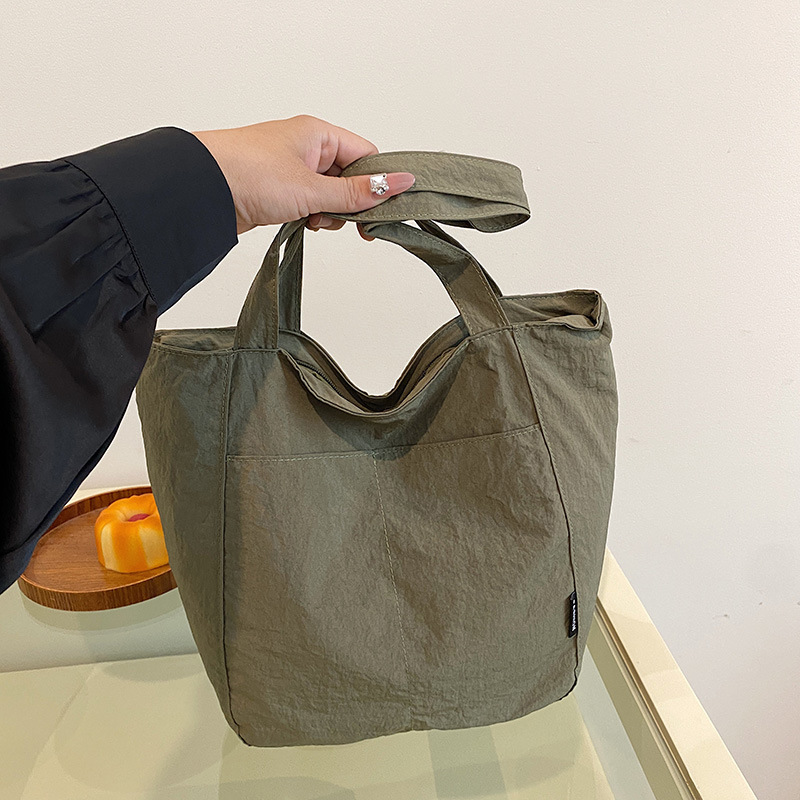 Casual japonés nylon impermeable ocio color sólido simple de gran capacidad para estudiantes de clase de viaje de hombro mochila