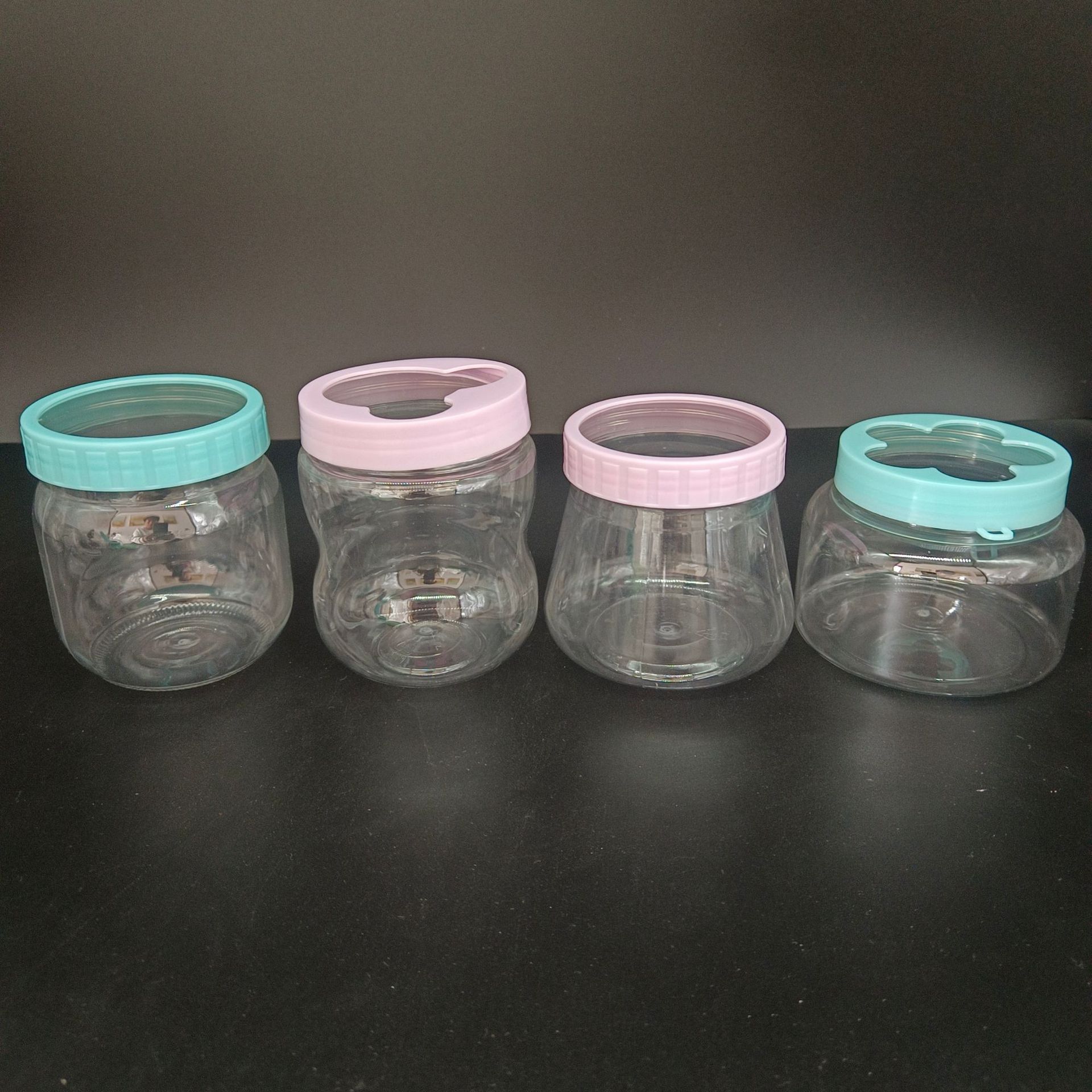 70口彩盖异型水晶泥起泡胶儿童饰品透明包装罐零食糖果包装瓶